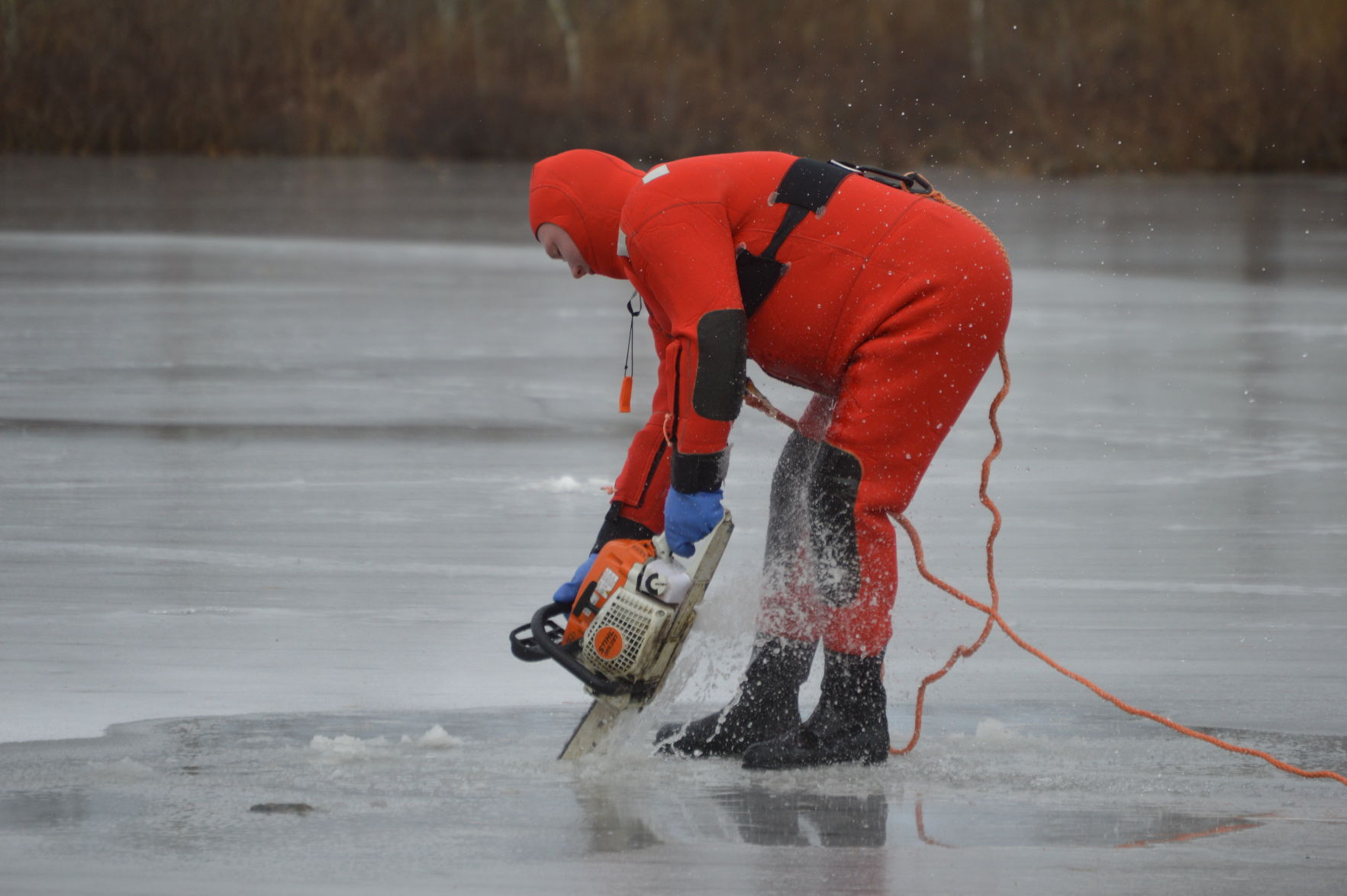 Checking the ice on Great Pond in Kingston